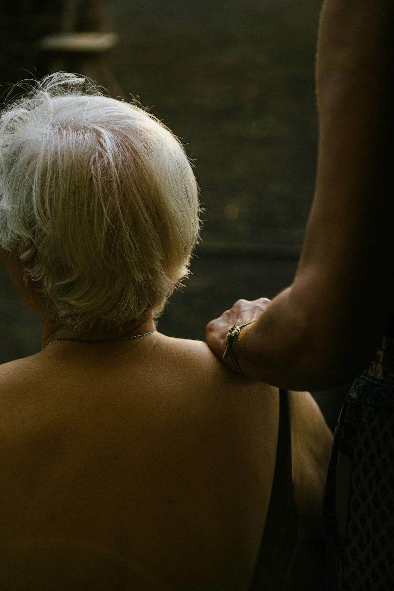 Photograph — woman's shoulder and neck
